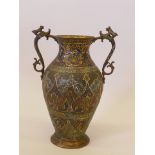 A Kashmiri gilt brass and enamel vase, with dragon handles, probably late C19th, 13" high