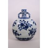 A Chinese blue and white porcelain two handled moon flask decorated with branches bearing fruit, 6