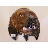 A Beswick wall plaque in the form of a dog's head, no. 668, 11" high