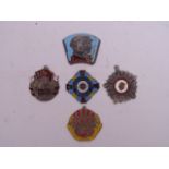 A collection of five Chinese enamelled metal medals, largest 2"