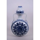 A Chinese blue and white porcelain two handled moon flask with Yin Yang decoration, 6 character mark