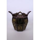 A Chinese lacquered hardwood and brass bound food container of octagonal form, with carved and