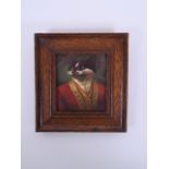 A framed porcelain tile decorated with a print of an anthropomorphic cat, 6½" x 7"