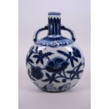 A small Chinese blue and white pottery flask with two handles and floral decoration, 4 character