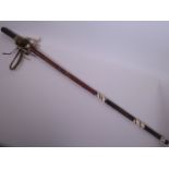 An African tribal swordstick with leather binding, 36" long