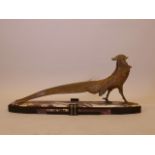 An Art Deco bronzed spelter figure of an exotic bird, mounted on a marble base, 34" x 15" high