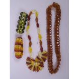 Two faux amber bead necklaces and two bracelets