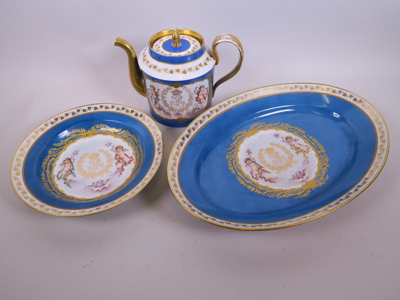 A Sevres Chateau des Tuileries porcelain cylindrical teapot, soup dish and oval platter, 15½" x