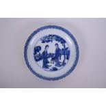 A Chinese blue and white porcelain shallow dish decorated with two women in a garden scene, 6