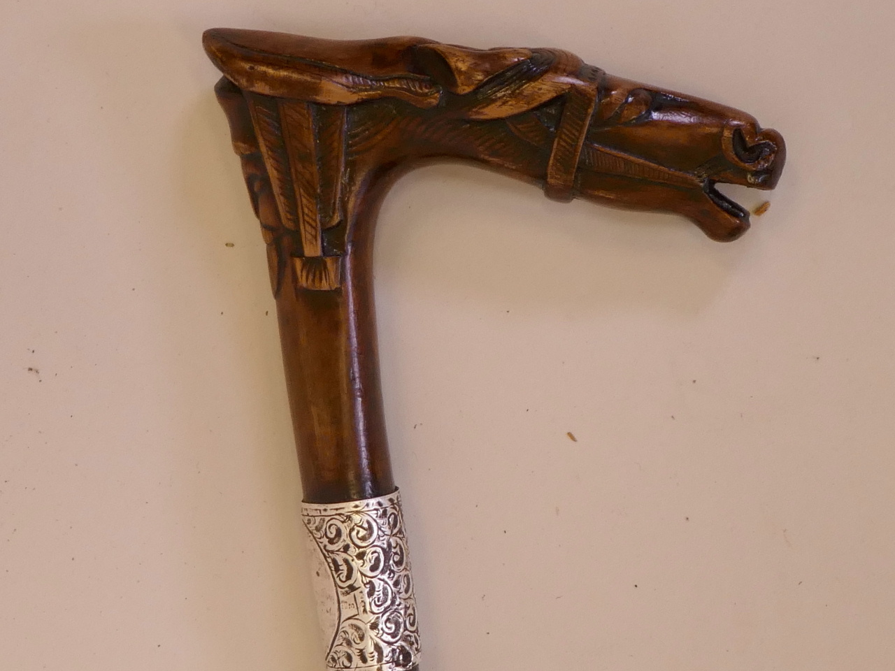 A walking stick, the handle carved in the form of a horse's head, with a silver mount, 37" high - Image 2 of 4