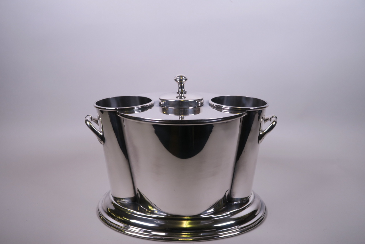 A silver plated twin section, two handled wine cooler, 12½" x 9"