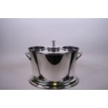 A silver plated twin section, two handled wine cooler, 12½" x 9"