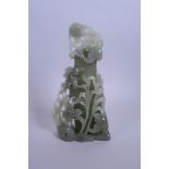 A Chinese carved celadon jade jar and cover with cockerel decoration, 9" high