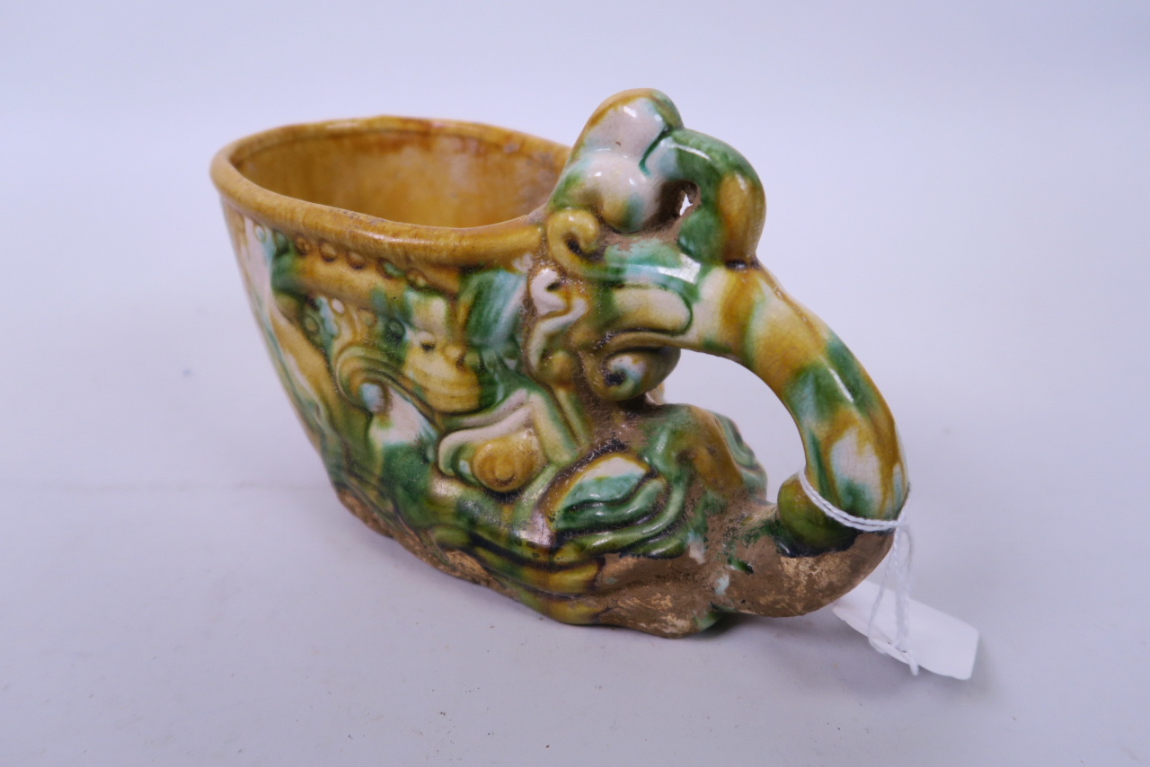 A Chinese Sancai glazed terracotta cup in the form of a dragon's head, 7½" long - Image 2 of 2