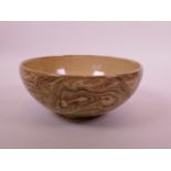 A Japanese natural clay studio bowl with a swirl/marbled glaze, 8" diameter