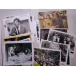 A collection of 35 lobby cards including 'The Virgin Soldiers', 'Scrooge', Wayne's World', '