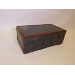 A vintage leather bound travel trunk
