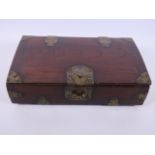 A brass bound Oriental hardwood dome top trinket box, 12" x 7" x 3"