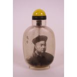 A Chinese reverse painted glass snuff bottle depicting a Chinese gentleman, character inscription