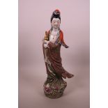 A large Chinese polychrome porcelain Quan Yin, impressed 6 character mark to base, 16½" high