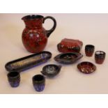 A collection of Murano blue and red swirled glass, with aventurine highlights