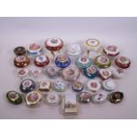 A large collection of Limoges porcelain trinket boxes, largest 3½" diameter