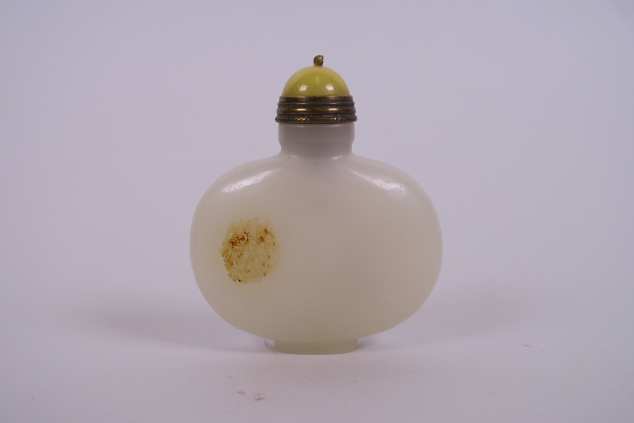 A Chinese white jade snuff bottle, 2½" high