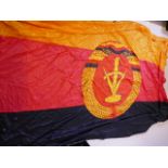 An East German flag, by repute flown over checkpoint Charlie, 68" x 105"