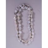 A long string of baroque pearls, 35" long