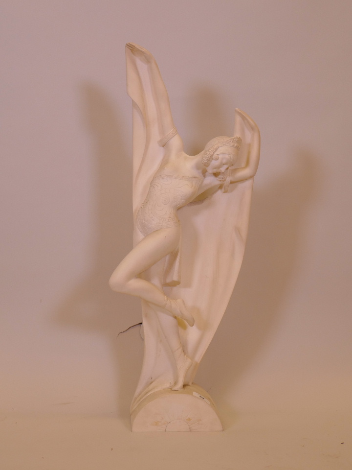 An Art Deco style plaster figure of a dancer, 27½" high