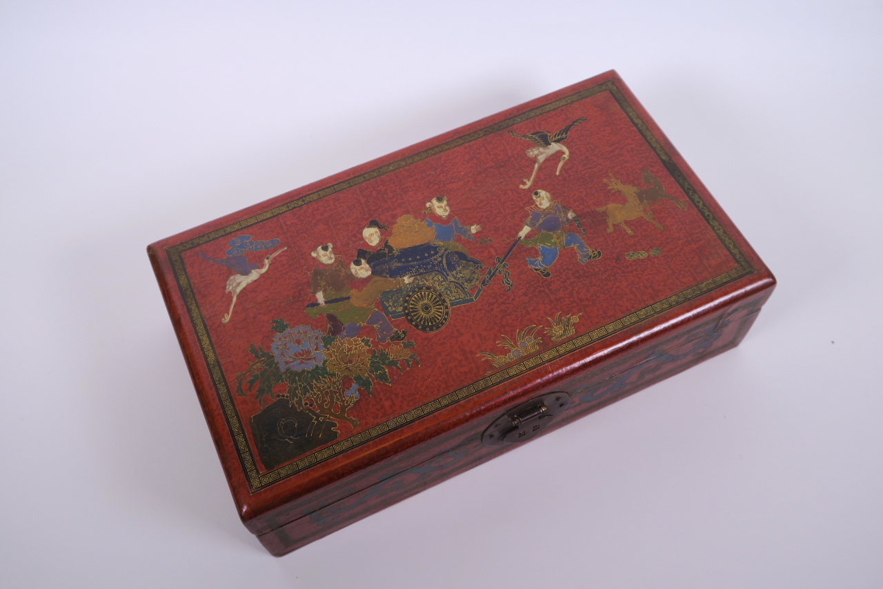 A Chinese red lacquer scribe's box decorated with figures pulling a cart, 13" x 7½" - Image 2 of 4