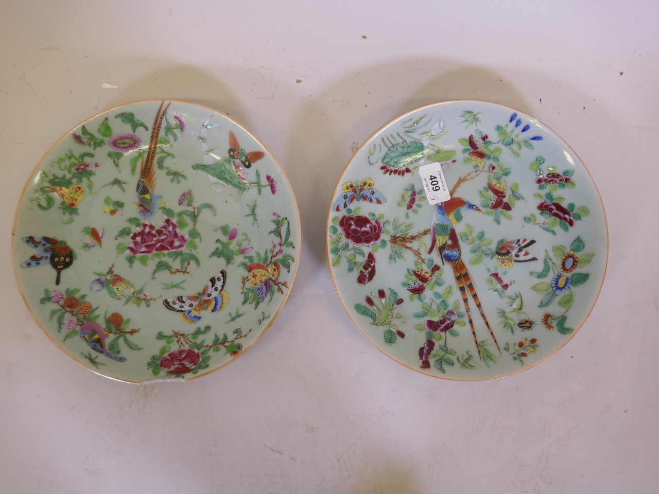 A pair of Chinese celadon ground plates with enamel decoration of Asiatic pheasants, 10" diameter, - Image 3 of 6