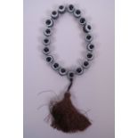 A string of banded agate eye beads, 16" long