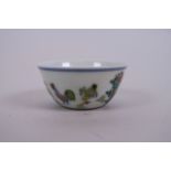 A Chinese doucai porcelain tea bowl decorated with chickens, 6 character mark to base, 3" diameter