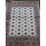 A Kashmiri ivory ground rug with Bokhara design, 70" x 46"