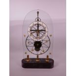 A brass mounted skeleton clock with enamelled numeric dial, 1" wide x 20" high