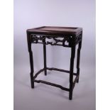 A Chinese carved hardwood occasional table, A/F, 9½" x 13", 18½" high