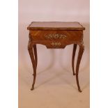 A C19th French parquetry inlaid kingwood work table with brass mounts, the lift up top with inset