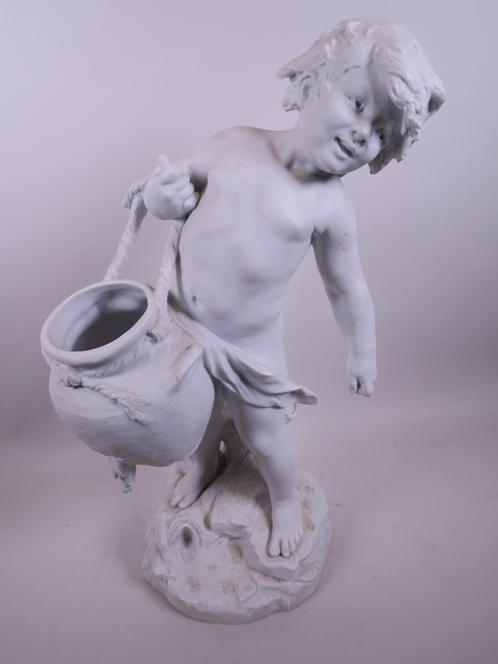 A French Parian porcelain figure of a cherub with a large amphora, Auguste Moreau, 19" high