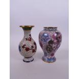 An Oriental cloisonné vase with peony decoration, together with another, 5" high