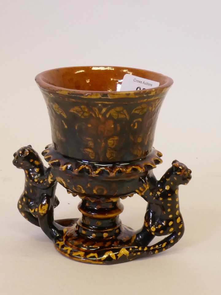 A slipware pottery goblet with polychrome floral decoration and leopard handles, 5" high - Image 2 of 4