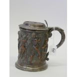 A C19th silver plated tankard with raised decoration of a classical procession, 6½" high