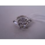 A substantial lady's three stone silver and cubic zirconia set ring, approximate size 'P'