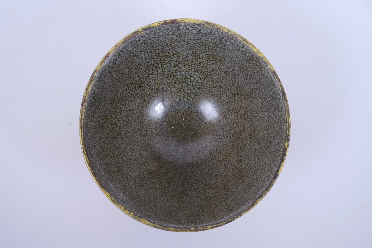 A Chinese celadon crackleware rice bowl with incised floral decoration and a gilt metal rim, 6" - Image 2 of 3