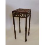 A painted wrought metal jardiniere stand, 8½" x 19" high