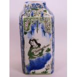 A Persian square section porcelain vase, the panels decorated with a girl pouring wine, a musician