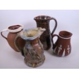 A studio pottery jug by Richard Dewar, 8" high, A/F, together with three other pottery jugs (4)