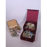 A quantity of costume jewellery to include necklaces, bracelets, brooches etc.