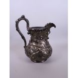 A C19th American pure coin silver water pitcher, mark of 'Jones, Ball and Poor' Boston, with