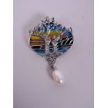 A silver and plique-à-jour brooch with landscape decoration and a freshwater pearl drop, 1" wide